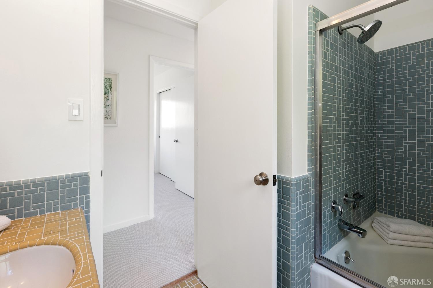 406 Middle Road Belmont, CA 94002 - Photo 44 of 67 a bathroom with a shower toilet and sink