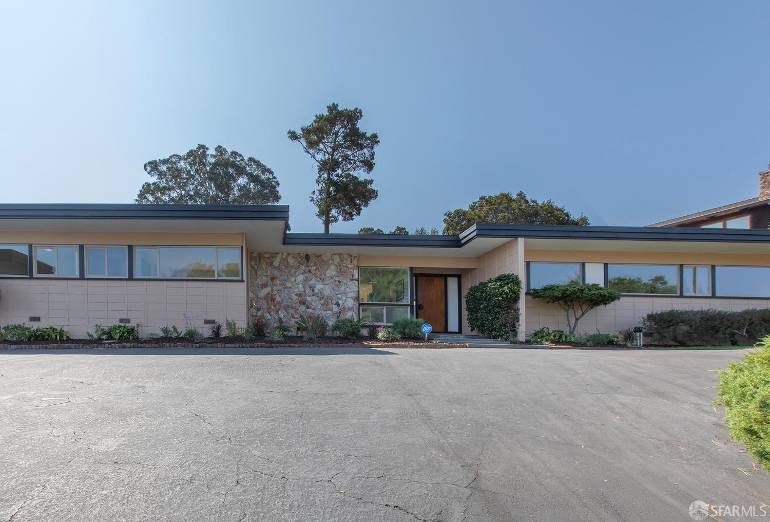 406 Middle Road Belmont, CA 94002 - Photo 58 of 67 front view of a house with a street