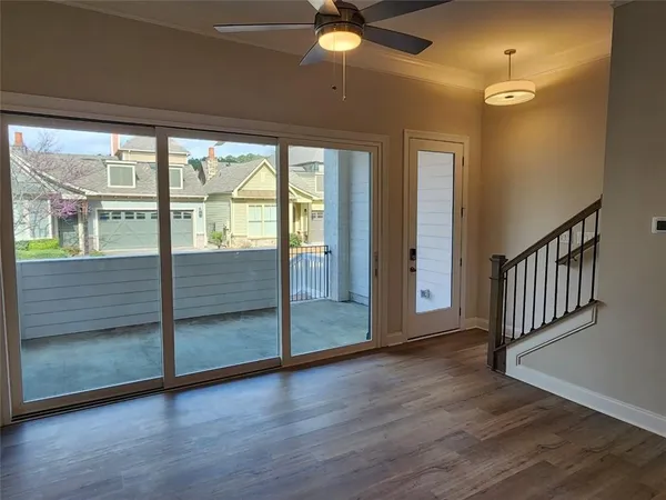 a view of entryway with wooden floor