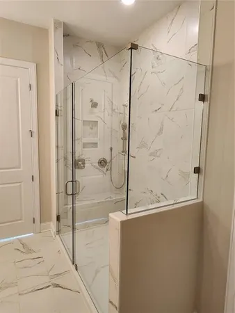 a view of entryway with wooden floor