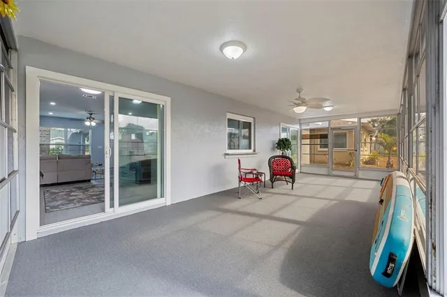 a living room with furniture and a gate