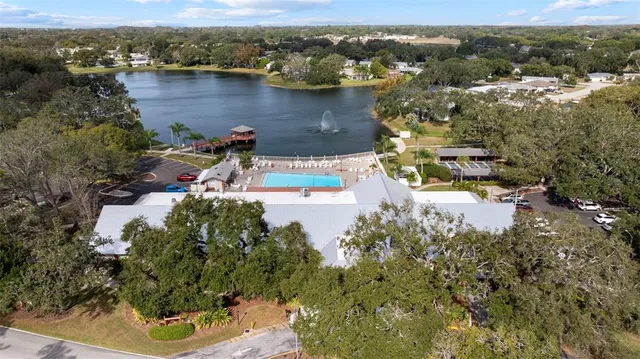 an aerial view of house with yard