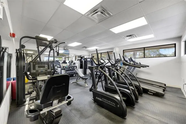 a view of swimming pool with seating space