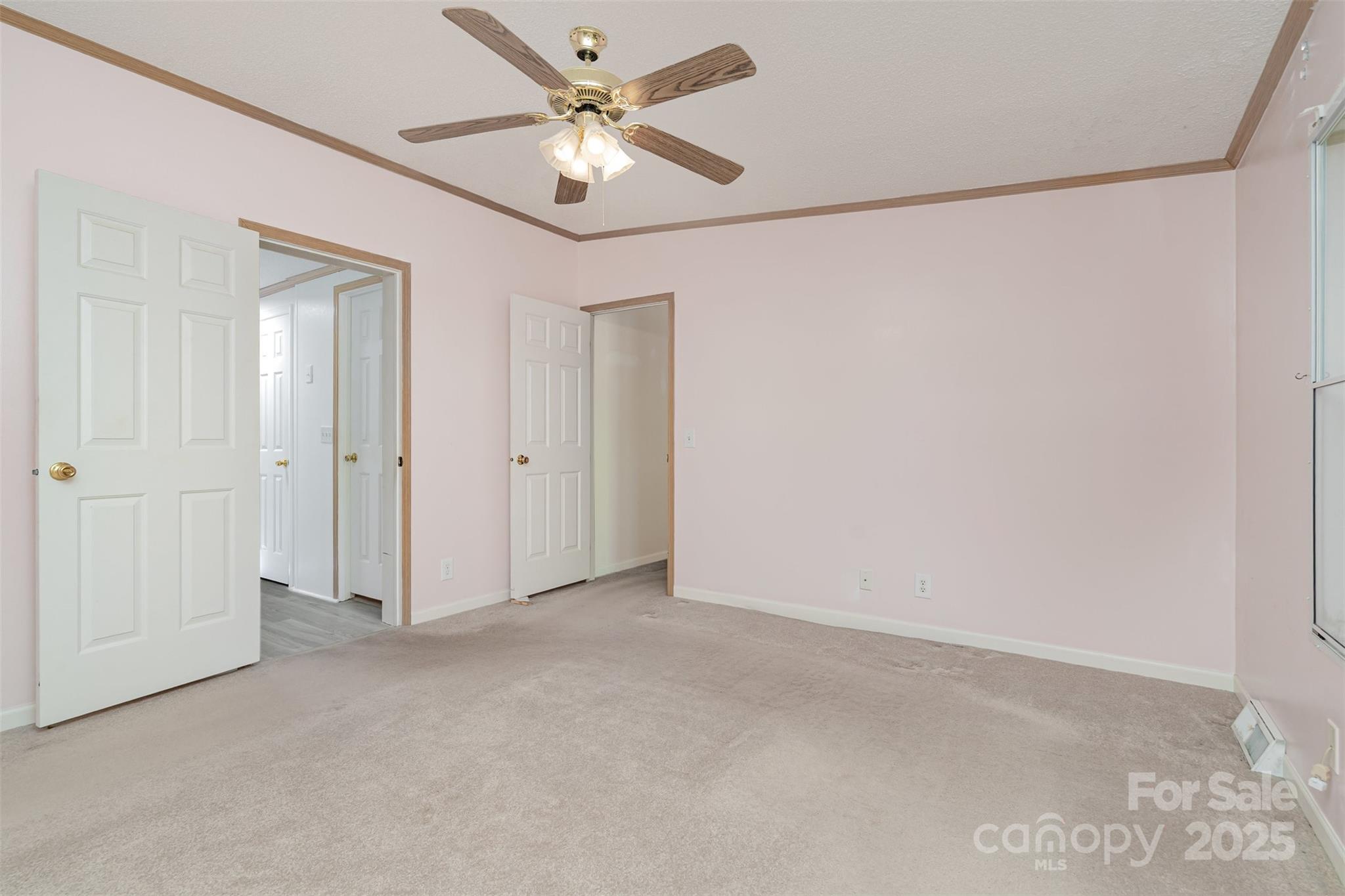 1979 Center Road Chester, SC 29706 - Photo 20 of 38 an empty room with a ceiling fan and a window