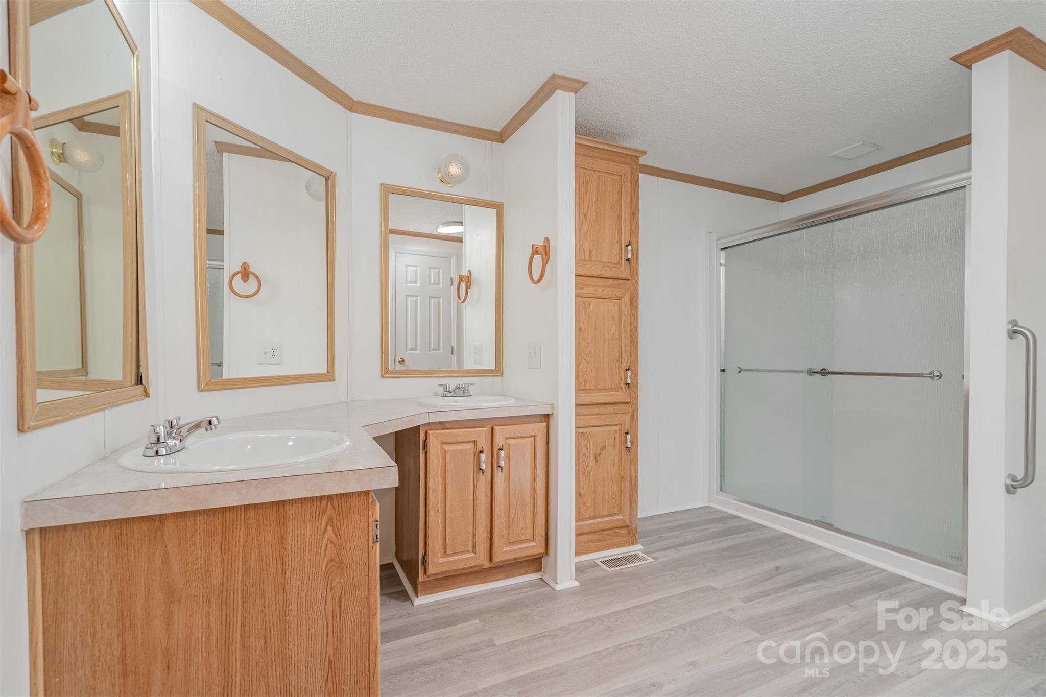 1979 Center Road Chester, SC 29706 - Photo 21 of 38 a bathroom with a sink mirror and a shower