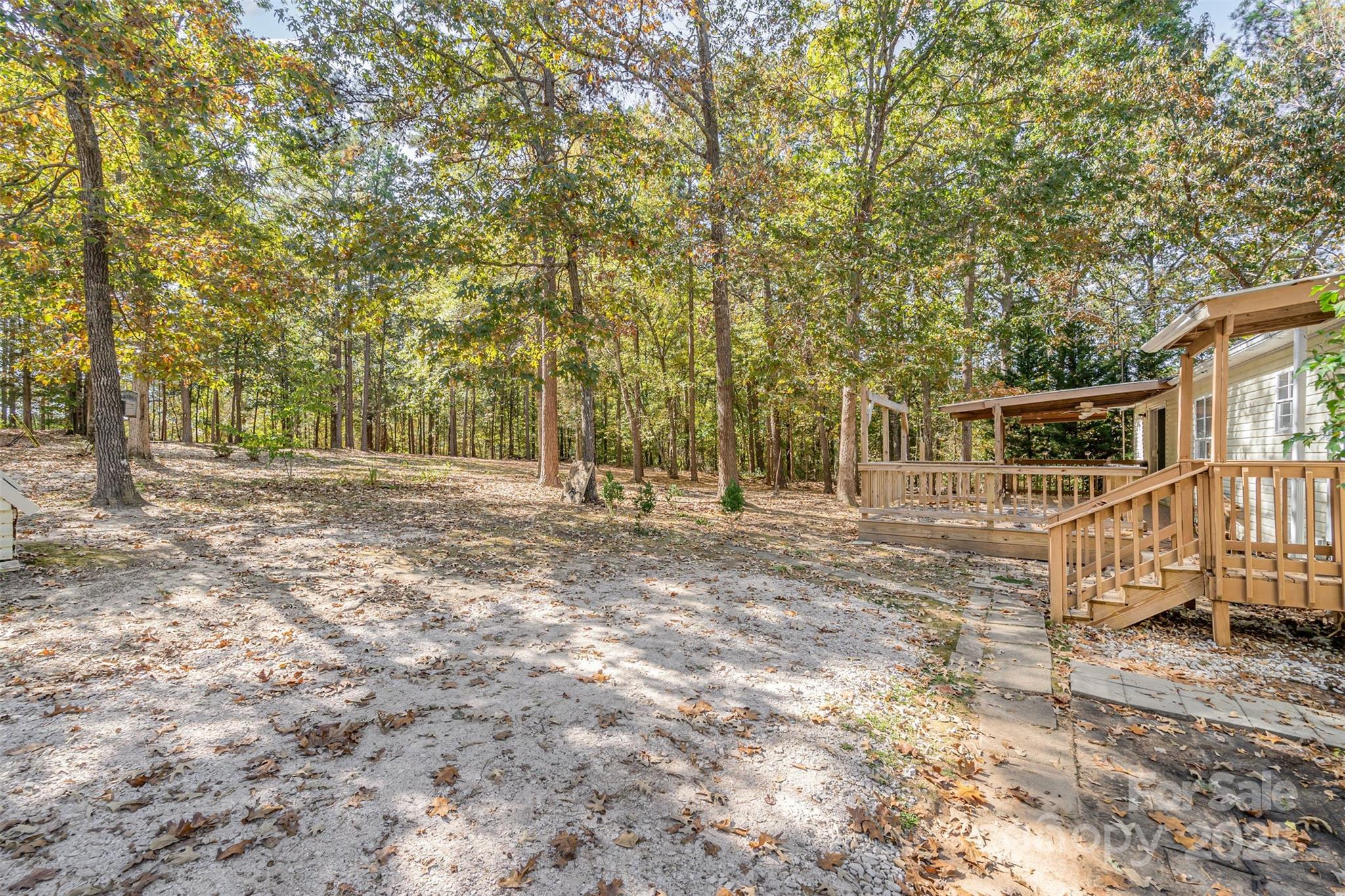 1979 Center Road Chester, SC 29706 - Photo 30 of 38 a view of a house with backyard and trees