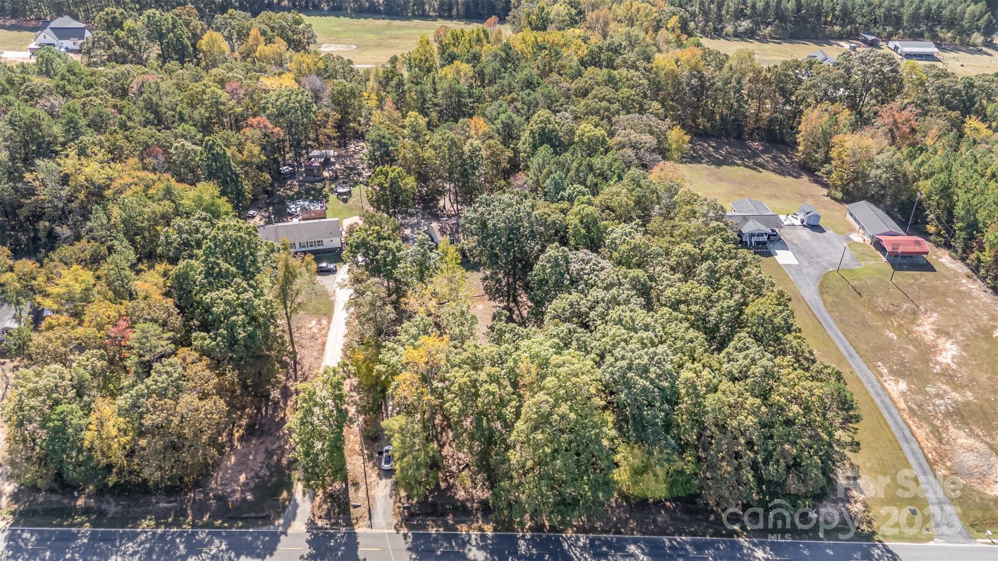 1979 Center Road Chester, SC 29706 - Photo 35 of 38 a view of a city with lush green forest