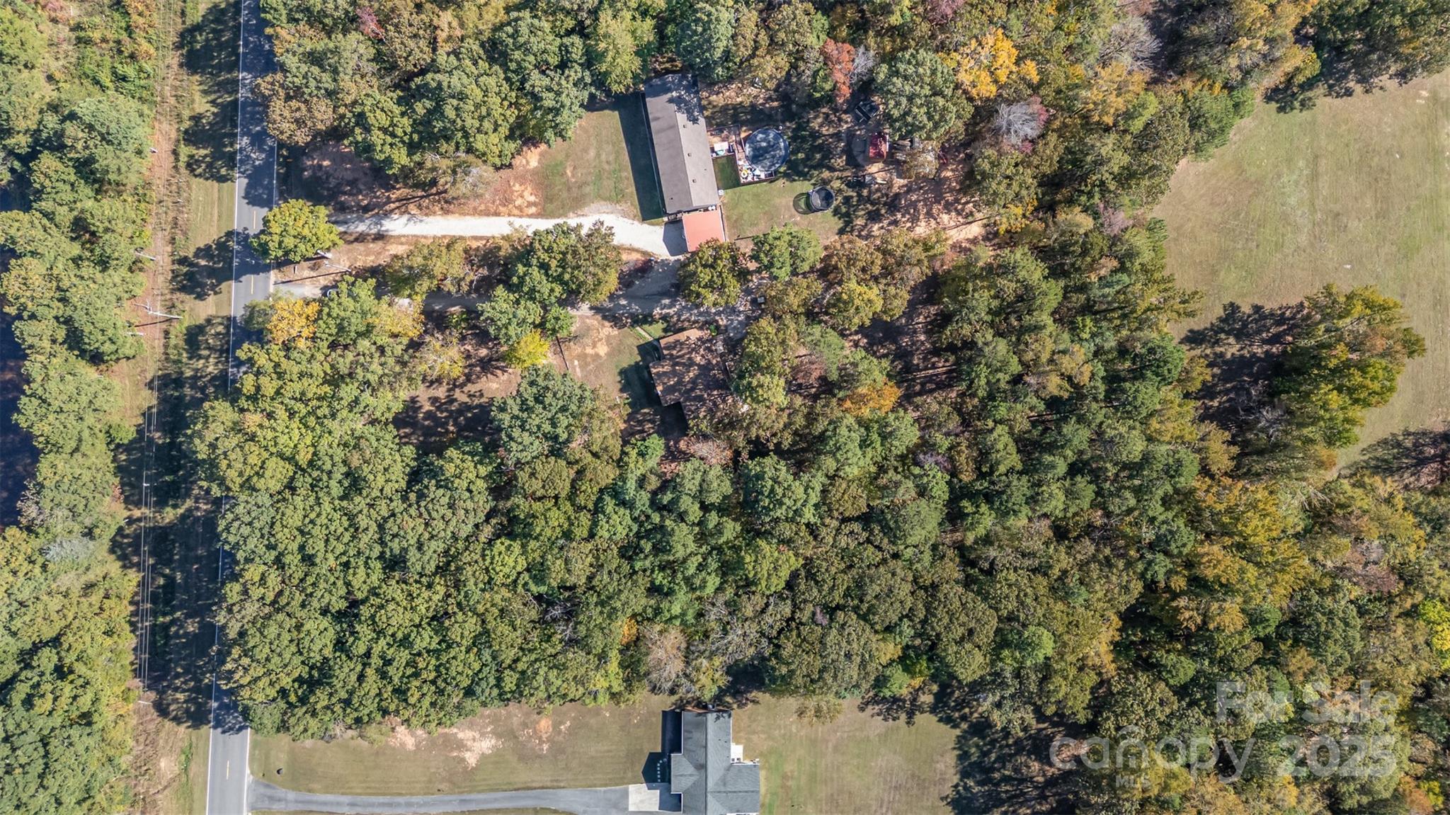 1979 Center Road Chester, SC 29706 - Photo 37 of 38 a view of a house in a forest