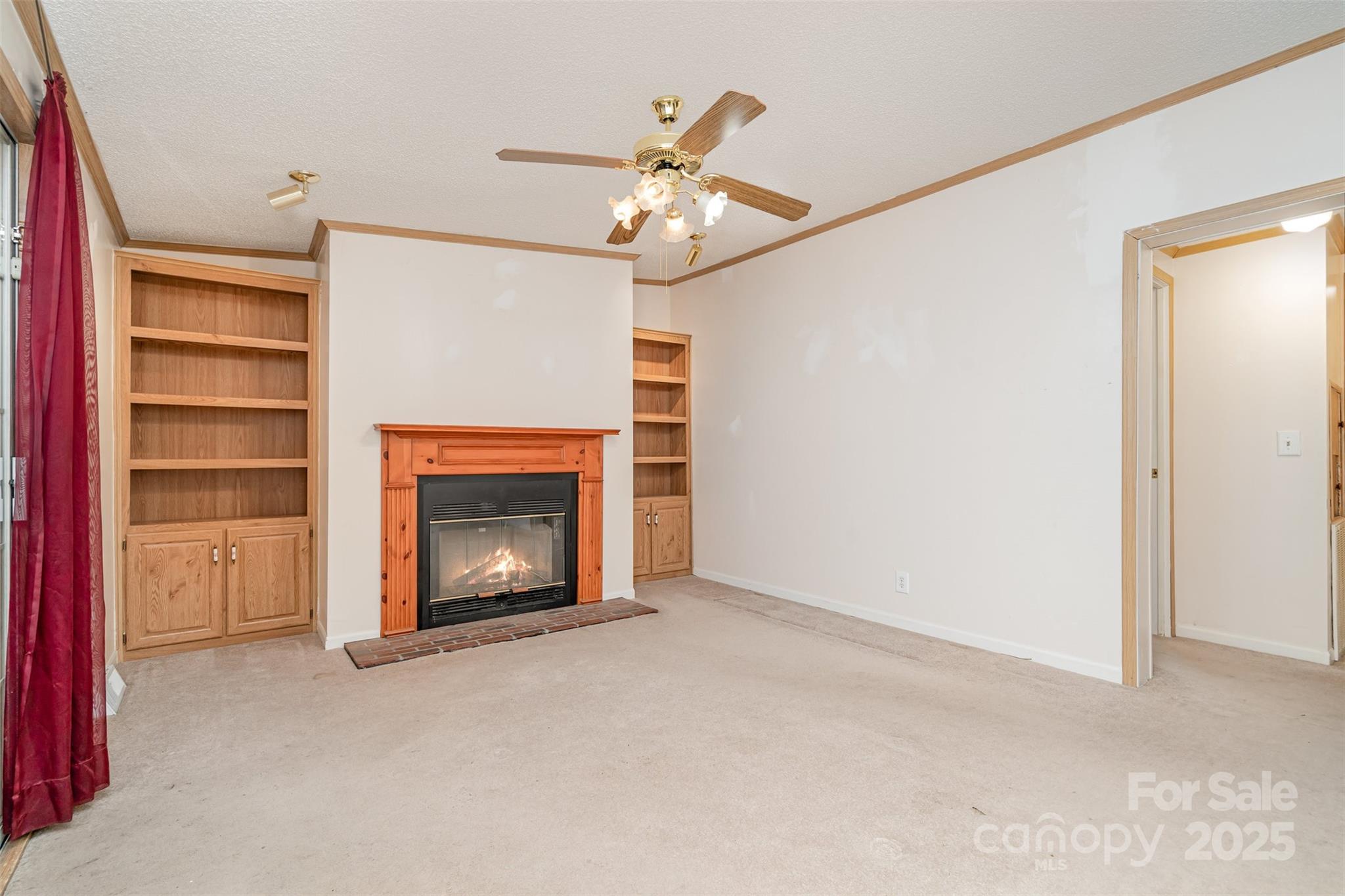 1979 Center Road Chester, SC 29706 - Photo 9 of 38 a view of an empty room with a fireplace