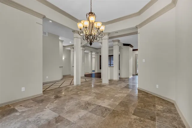 a view of a chandelier in a room and a chandelier