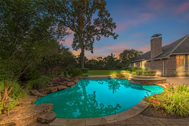a view of a lake with a garden and lake view