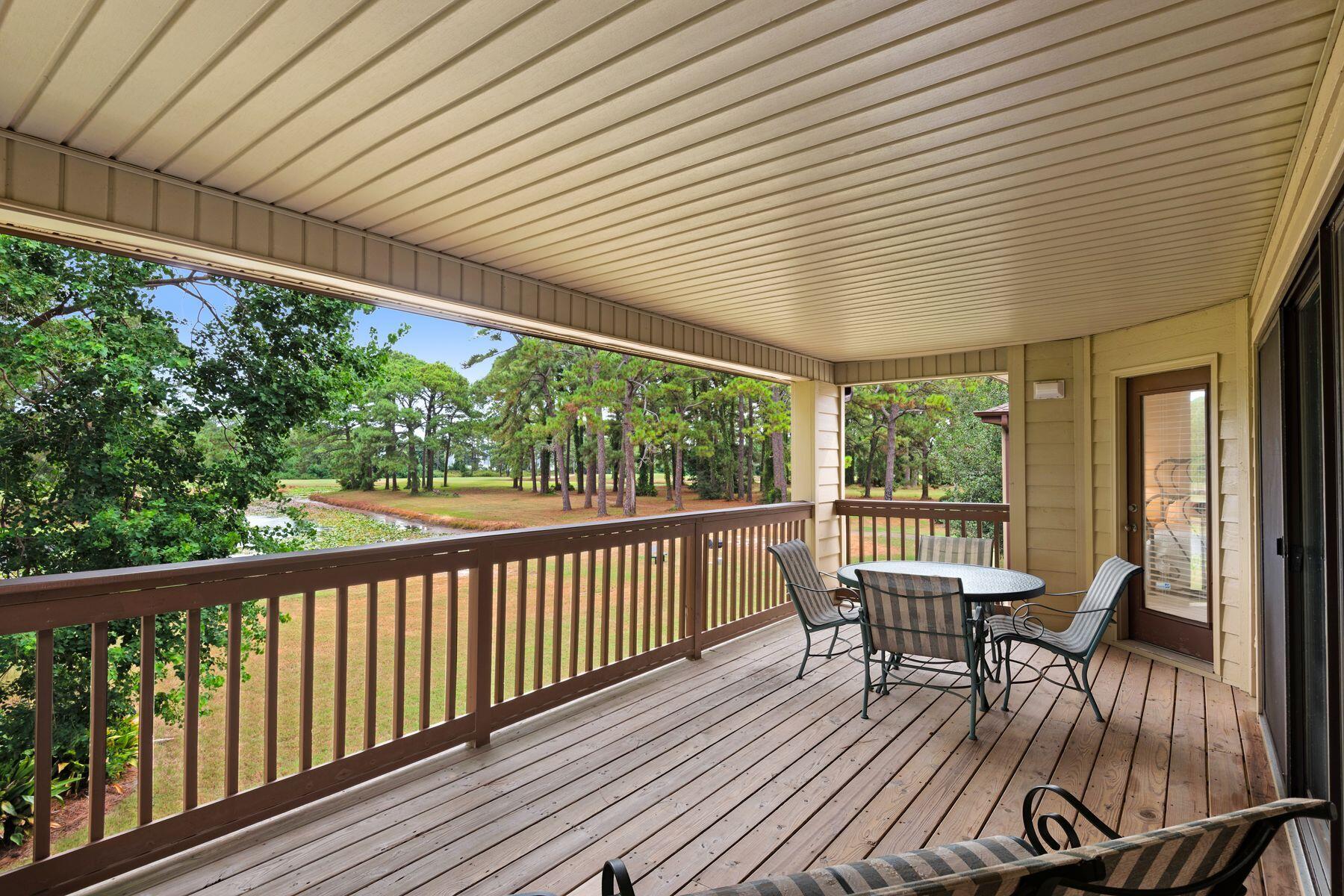 77 Golf Tee Lane, Unit 27G Miramar Beach, FL 32550 - Photo 1 of 29 a view of a two chairs and table in the balcony