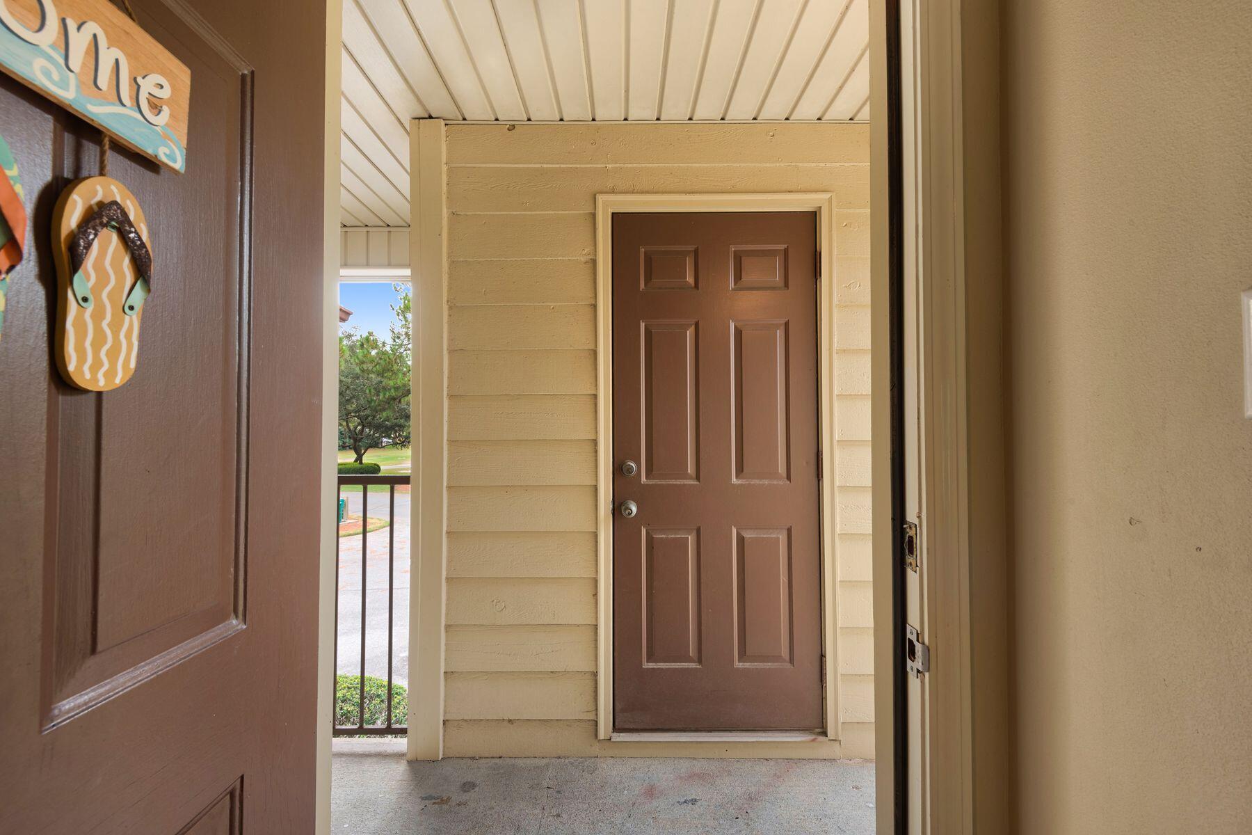 77 Golf Tee Lane, Unit 27G Miramar Beach, FL 32550 - Photo 27 of 29 a door view with a outdoor space