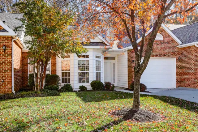 a kitchen with a stove and a microwave