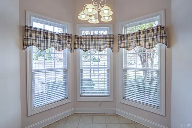 a kitchen with stainless steel appliances granite countertop a sink and a stove