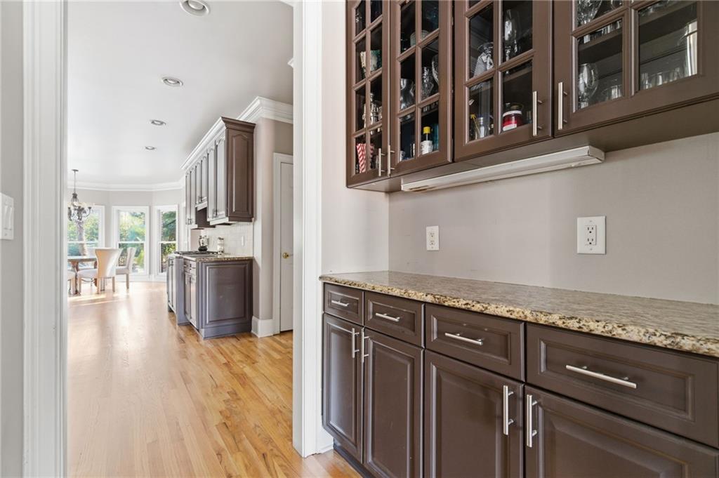 1607 Oak Grove Road Decatur, GA 30033 - Photo 15 of 71 a view of a kitchen with stainless steel appliances granite countertop a refrigerator and a stove top oven