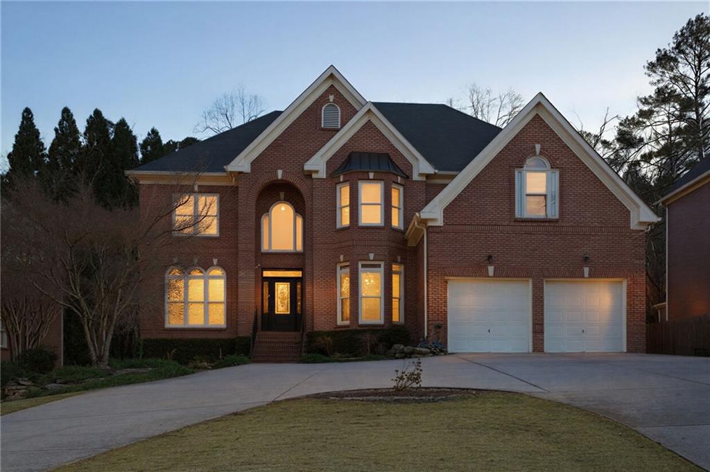 1607 Oak Grove Road Decatur, GA 30033 - Photo 2 of 71 a front view of a house with a yard