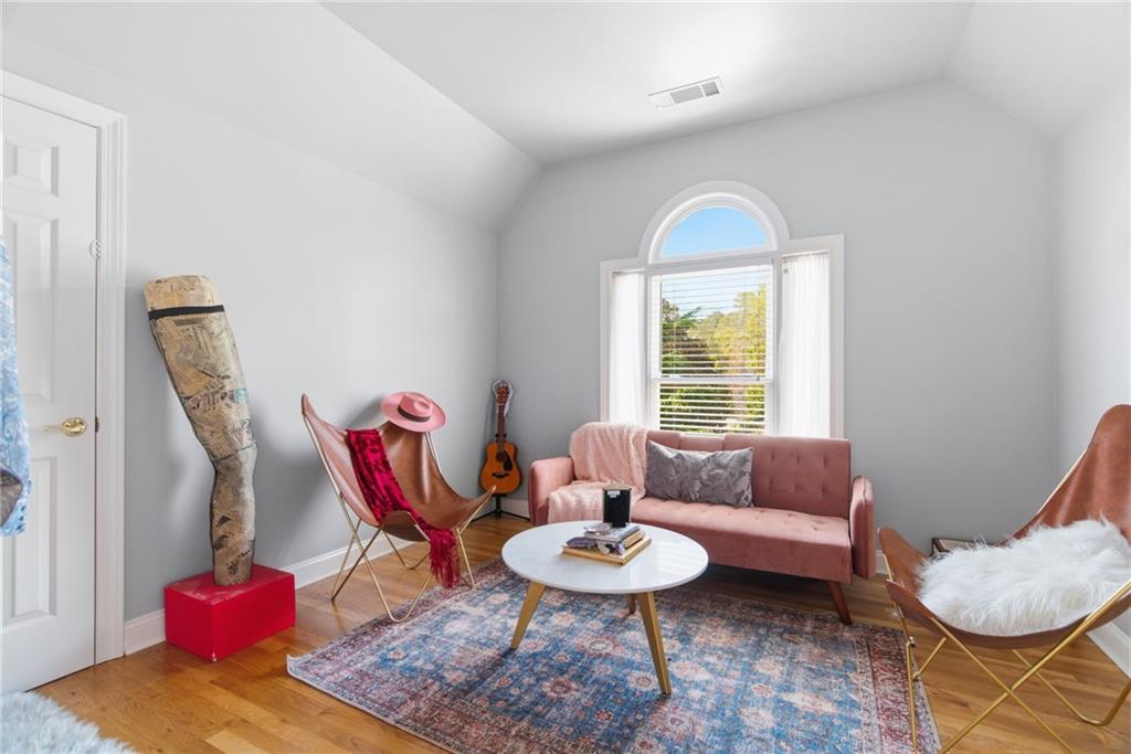 1607 Oak Grove Road Decatur, GA 30033 - Photo 32 of 71 a living room with furniture and a window