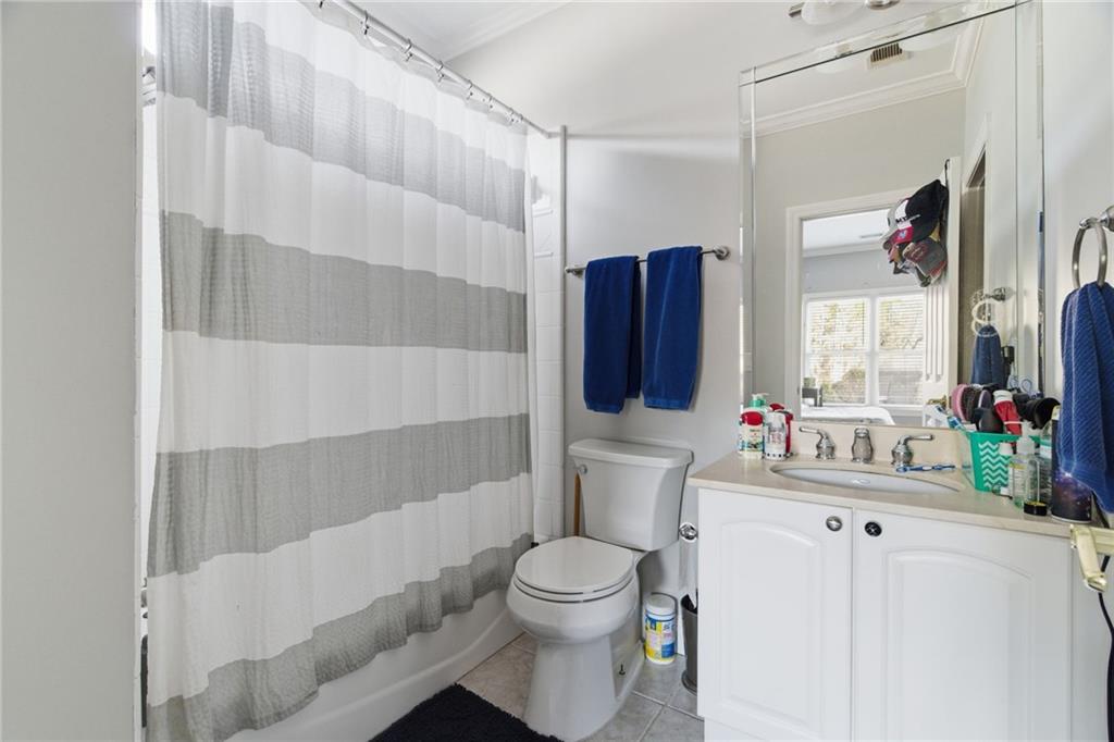 1607 Oak Grove Road Decatur, GA 30033 - Photo 35 of 71 a bathroom with a sink toilet and shower