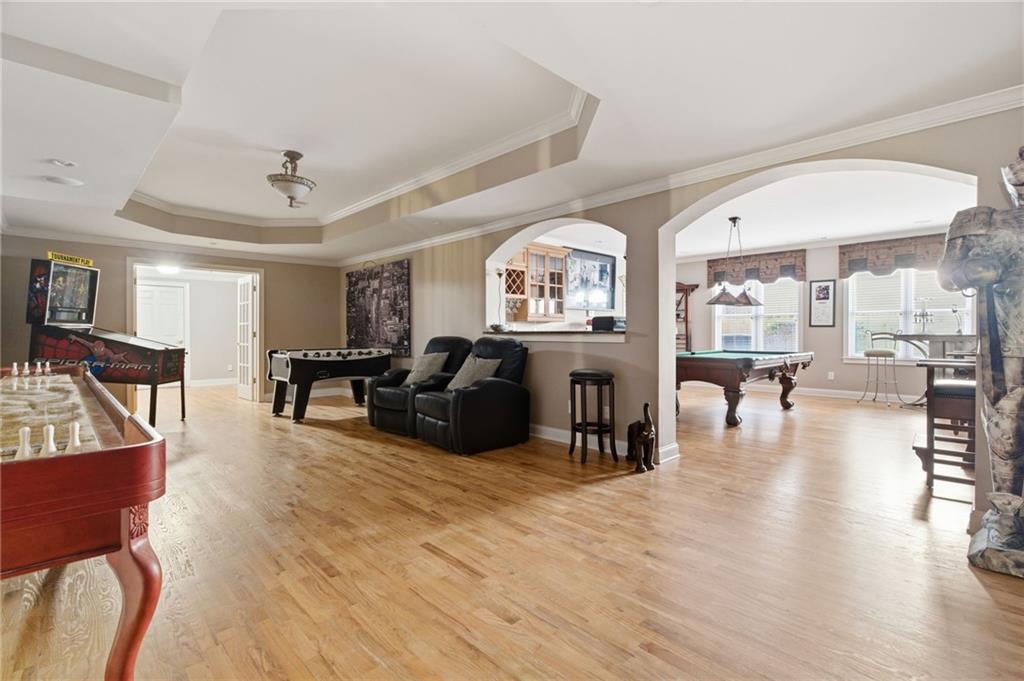 1607 Oak Grove Road Decatur, GA 30033 - Photo 38 of 71 a living room with fireplace furniture and wooden floor
