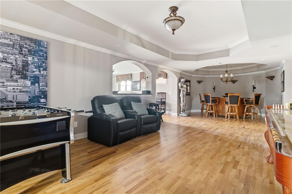 1607 Oak Grove Road Decatur, GA 30033 - Photo 39 of 71 a living room with furniture and a fireplace
