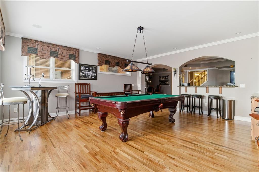 1607 Oak Grove Road Decatur, GA 30033 - Photo 41 of 71 a living room with furniture a window and wooden floor