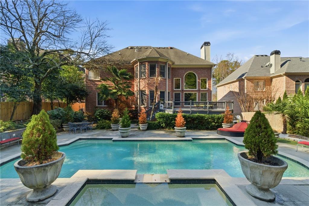 1607 Oak Grove Road Decatur, GA 30033 - Photo 47 of 71 a front view of a house with a garden