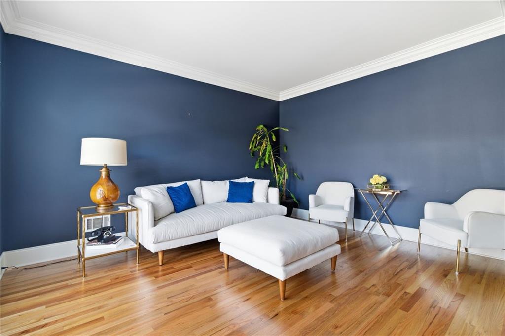 1607 Oak Grove Road Decatur, GA 30033 - Photo 5 of 71 a living room with furniture and wooden floor