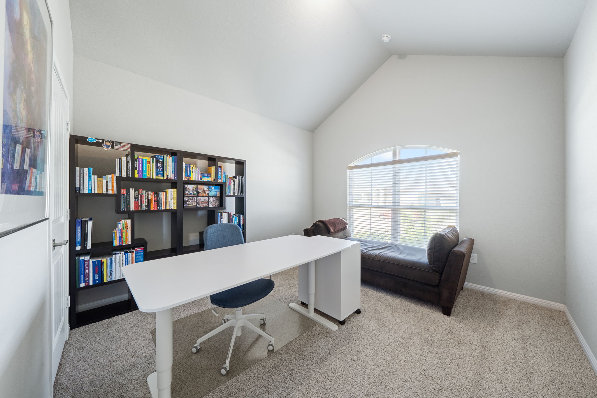 2412 Starhill Ranch Street Georgetown, TX 78628 - Photo 4 of 40 A quiet office space offers ample natural light and a dedicated area for productivity.