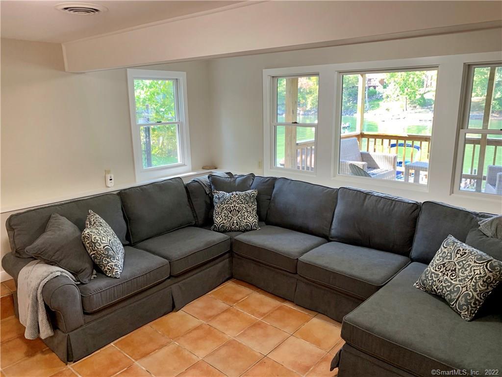 11 Candlewood Road New Fairfield, CT 06812 - Photo 14 of 24 a living room with furniture and a large window