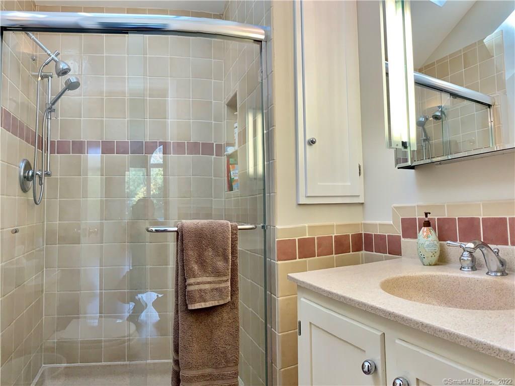 11 Candlewood Road New Fairfield, CT 06812 - Photo 20 of 24 a bathroom with a sink and a mirror