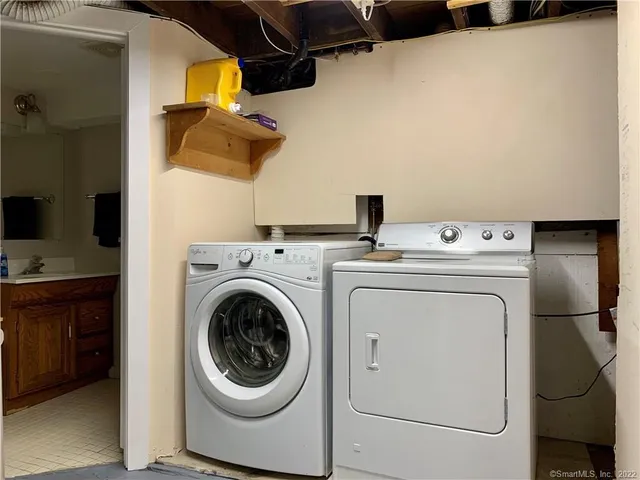 a utility room with dryer and washer