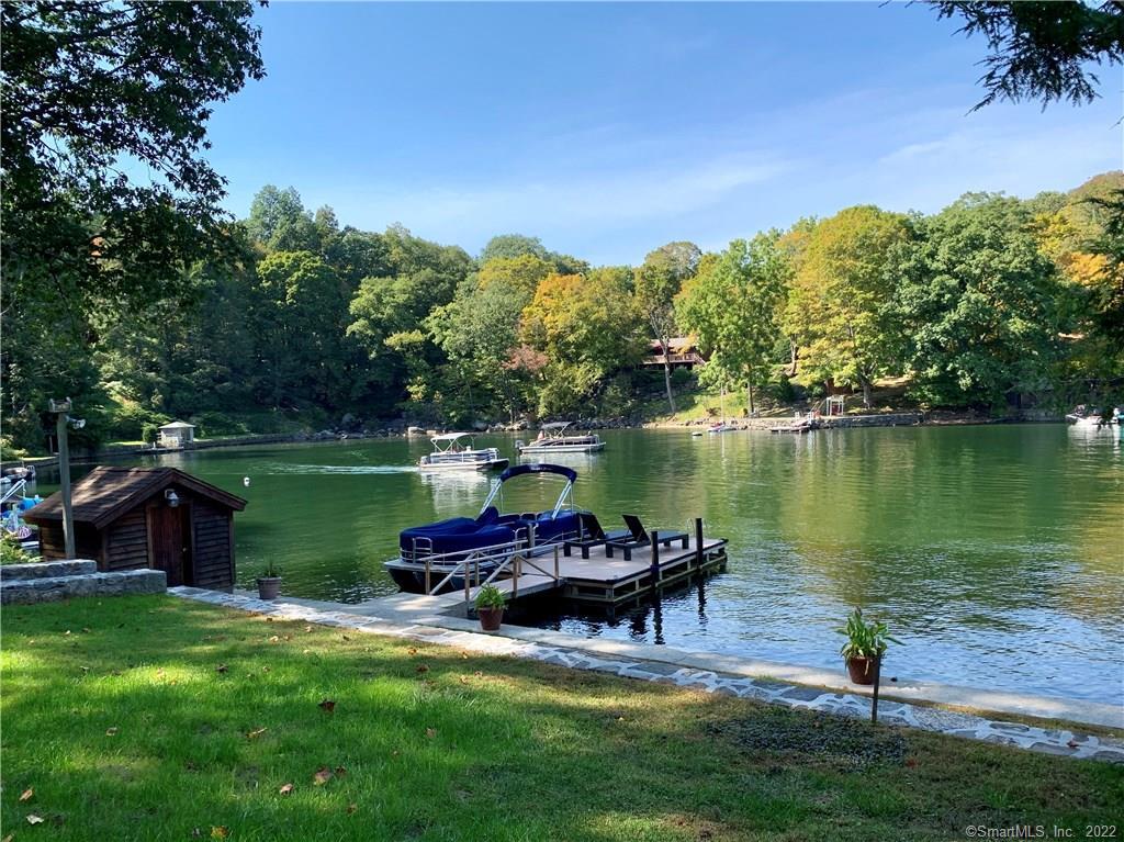 11 Candlewood Road New Fairfield, CT 06812 - Photo 7 of 24 a swimming pool with outdoor seating and yard