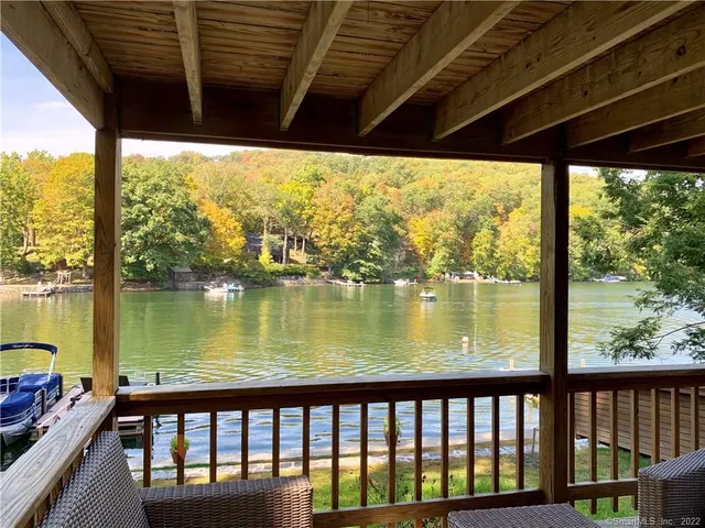 a view of a balcony with lake view