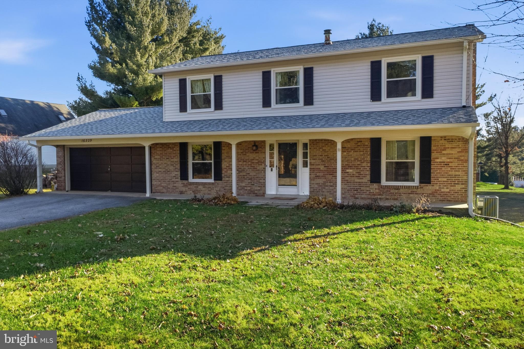 16329 Old Frederick Road Mount Airy, MD 21771 - Photo 4 of 11 front view of a house with a yard
