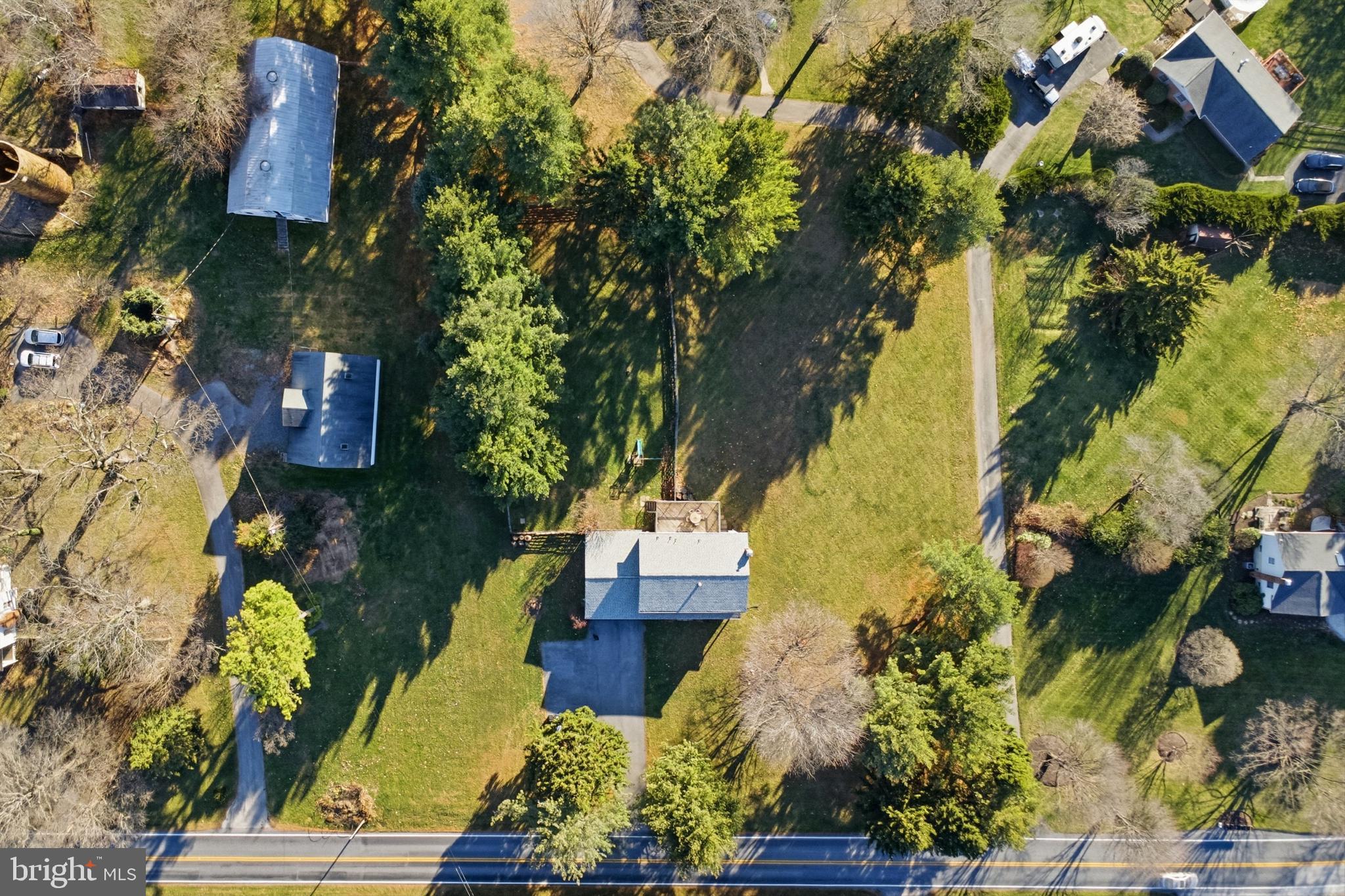 16329 Old Frederick Road Mount Airy, MD 21771 - Photo 6 of 11 an aerial view of a house with a yard swimming pool and outdoor seating