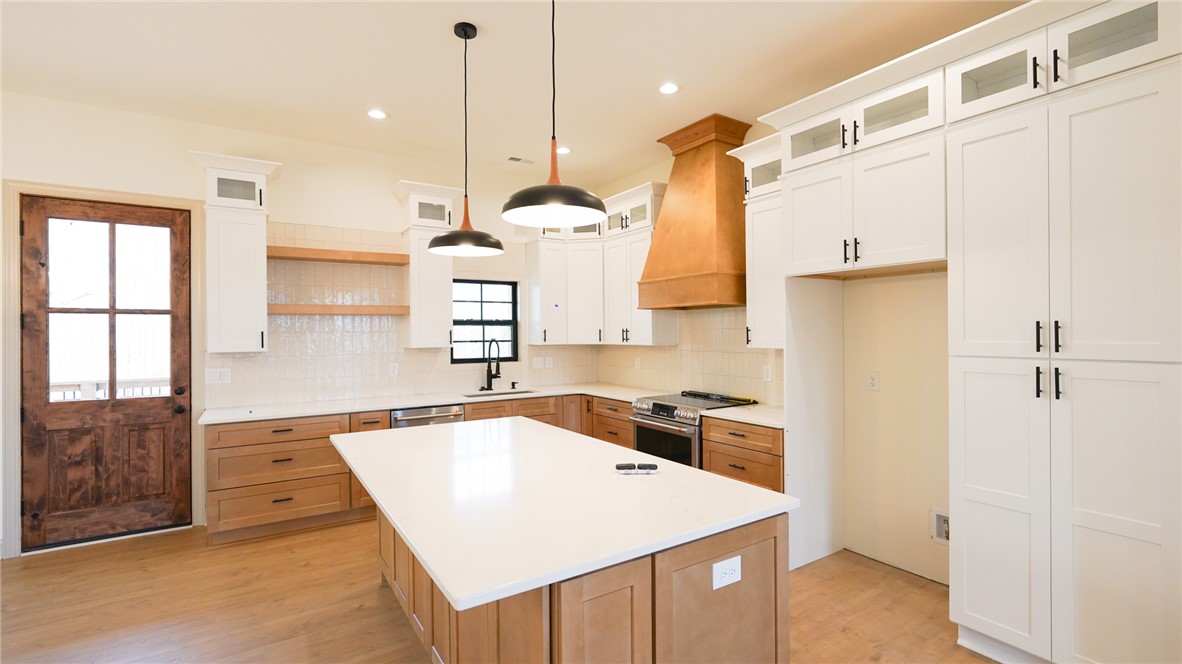 1001 Five Forks Road Pendleton, SC 29670 - Photo 13 of 43 This newly designed kitchen features an island, ample cabinetry, and modern appliances.