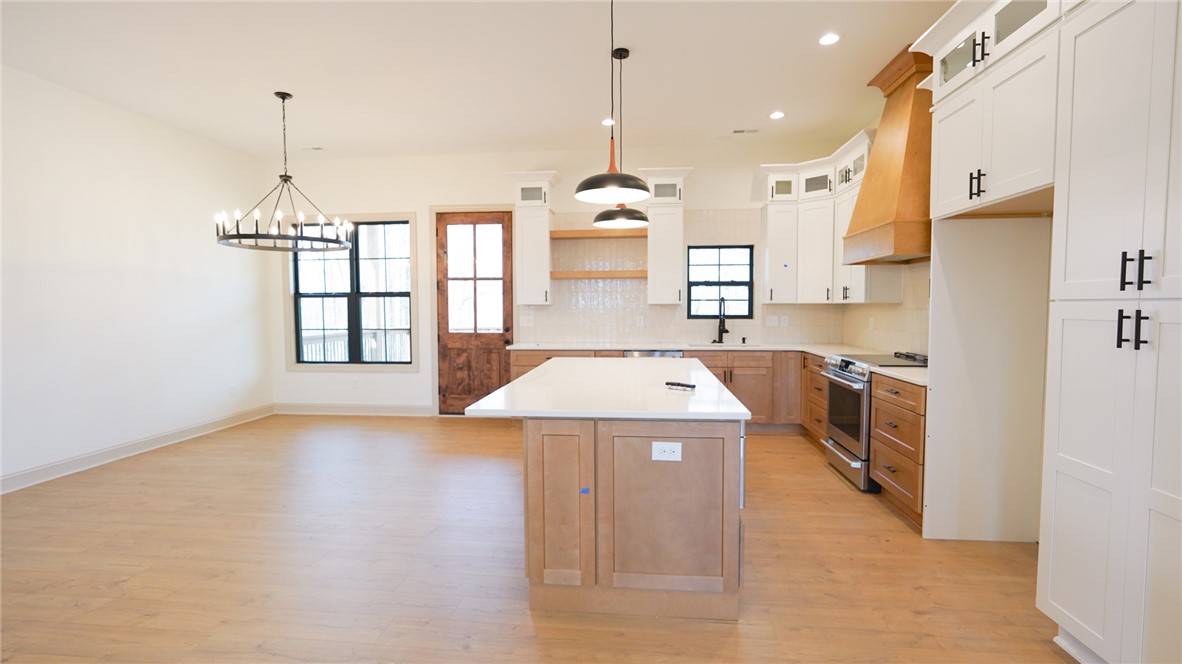 1001 Five Forks Road Pendleton, SC 29670 - Photo 14 of 43 This spacious interior features a functional kitchen and inviting dining area.