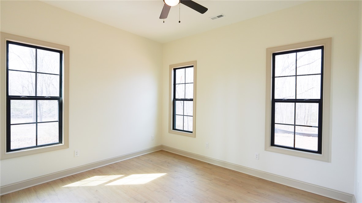 1001 Five Forks Road Pendleton, SC 29670 - Photo 16 of 43 This airy room offers a bright, versatile space, ready for personalization and comfortable living.