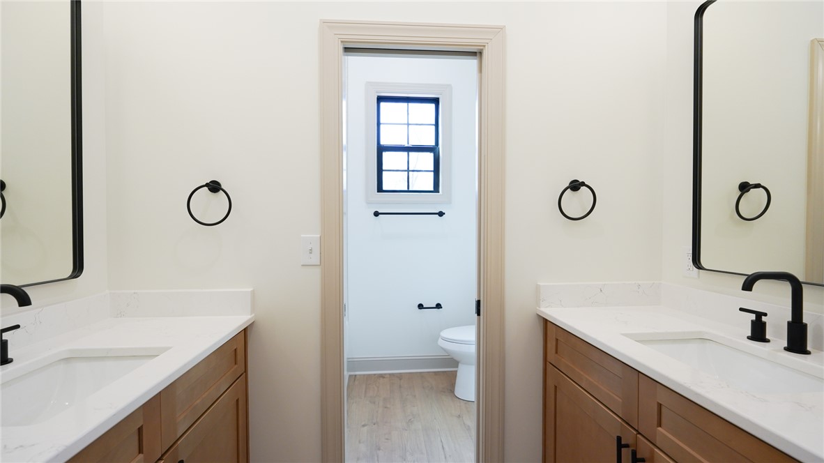 1001 Five Forks Road Pendleton, SC 29670 - Photo 21 of 43 This modern bathroom features a dual vanity, providing ample space and convenience.