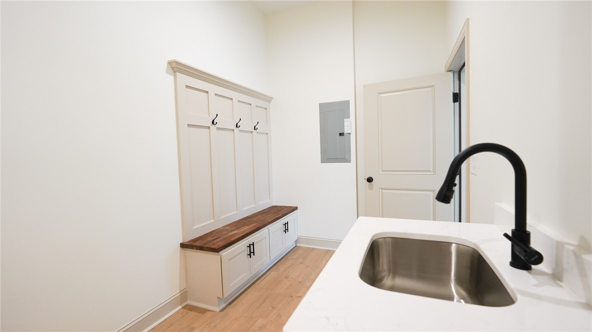 1001 Five Forks Road Pendleton, SC 29670 - Photo 34 of 43 Functional mudroom with convenient storage and a sleek utility sink for daily tasks.