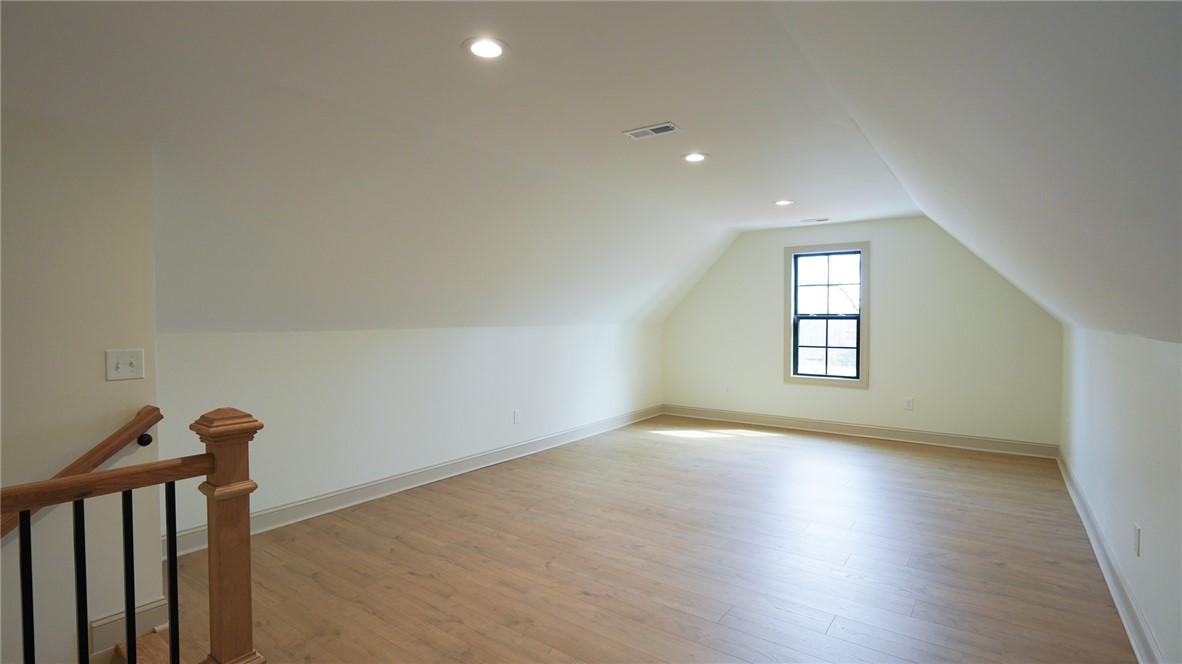 1001 Five Forks Road Pendleton, SC 29670 - Photo 36 of 43 Bright and airy loft space with sloped ceilings and natural light.