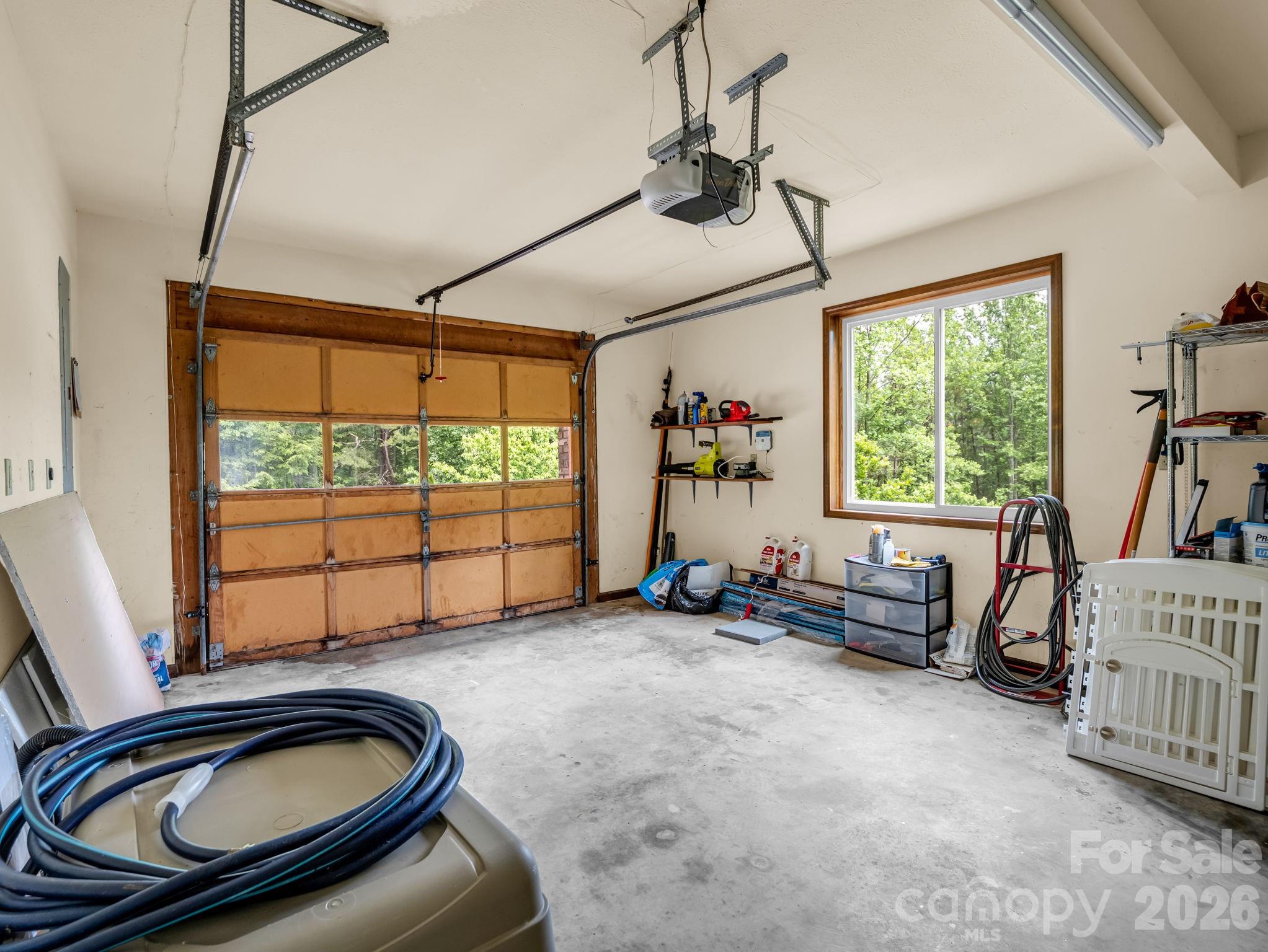 656 Cashiers Valley Road Brevard, NC 28712 - Photo 28 of 37 a room with furniture and windows