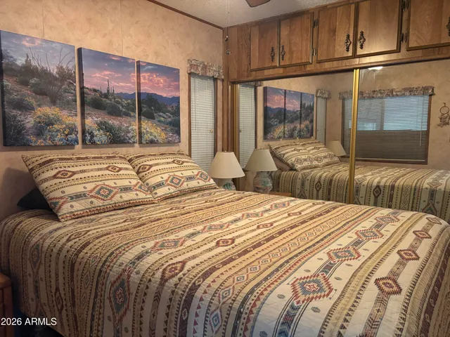 a view of a dining room with clothes and shoes
