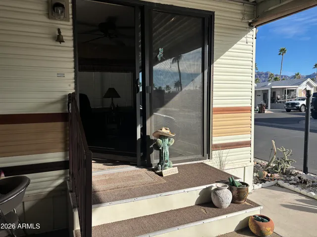 a vase of flowers sitting on a table