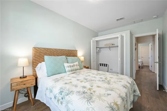 a bathroom with a sink toilet vanity and shower