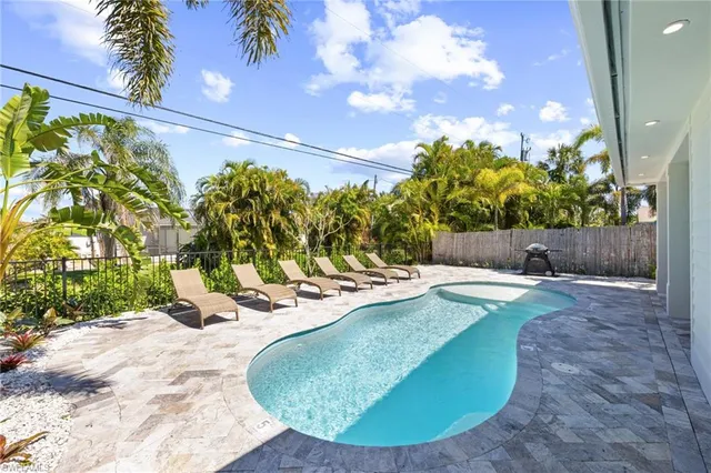 a building view with sitting space and garden view