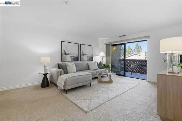 a kitchen with stainless steel appliances granite countertop a stove a microwave and cabinets