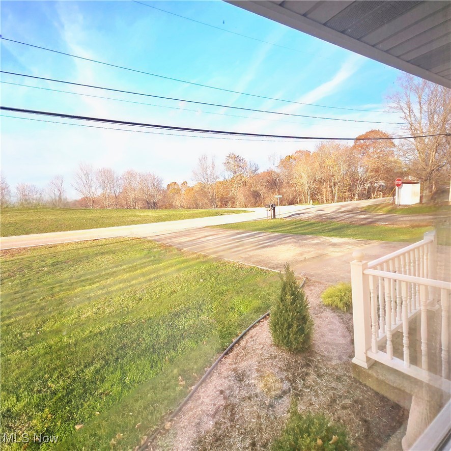 1549 New England Ridge Road Washington, WV 26181 - Photo 4 of 27 View of front yard and main road.