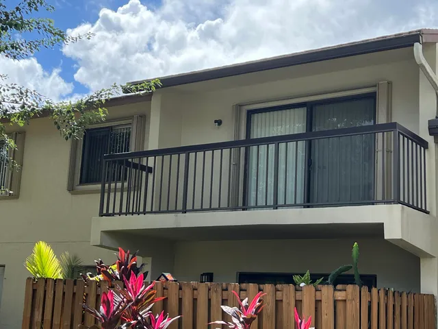 a view of building with a balcony